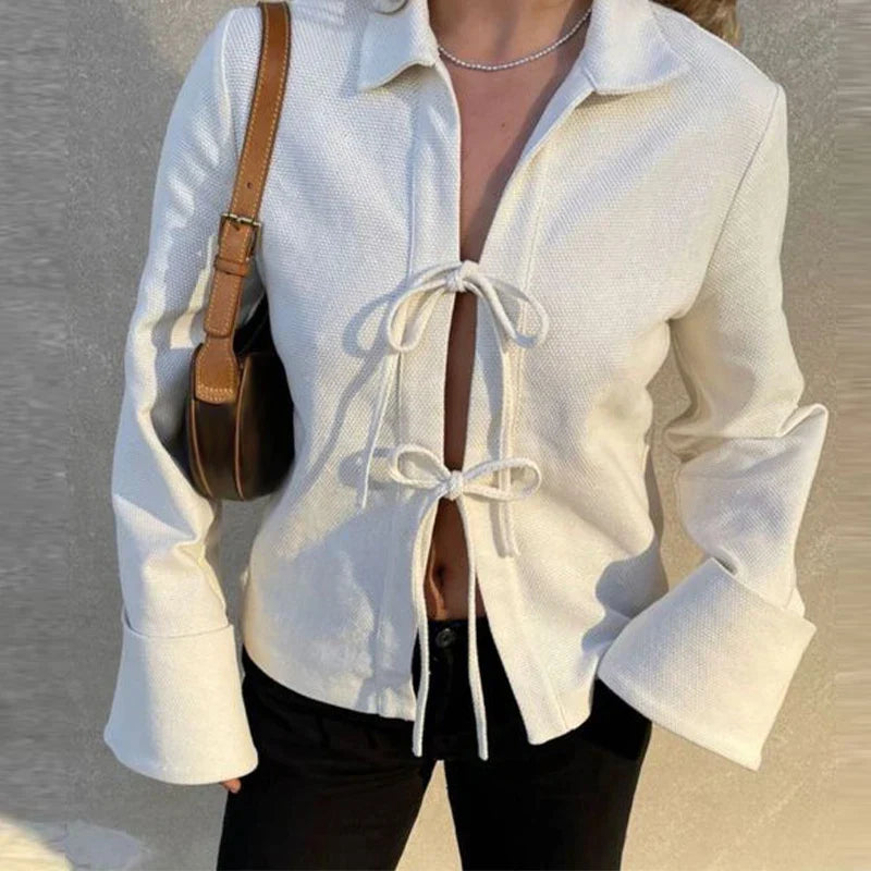 Gestructureerd vest met uitlopende mouwen