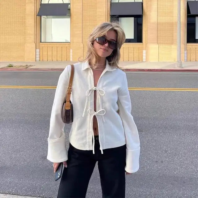 Gestructureerd vest met uitlopende mouwen