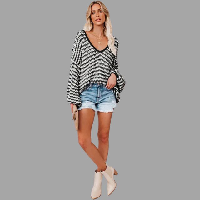 Gebreide trui met off-the-shoulder design