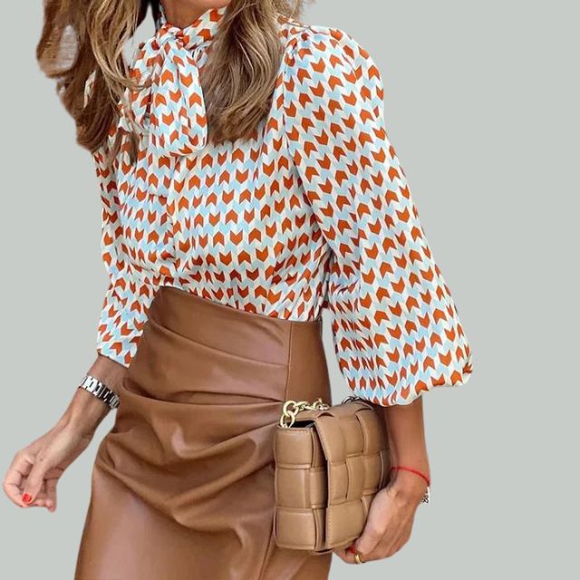 Blouse met houndstooth print en hoge kraag