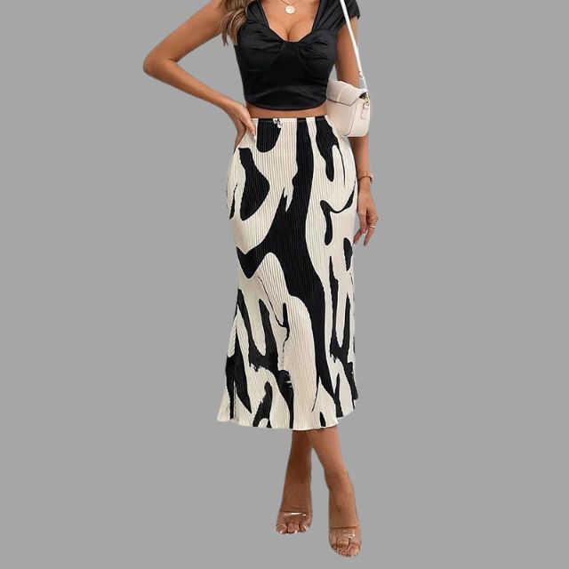 Geplooide midirok met abstracte print