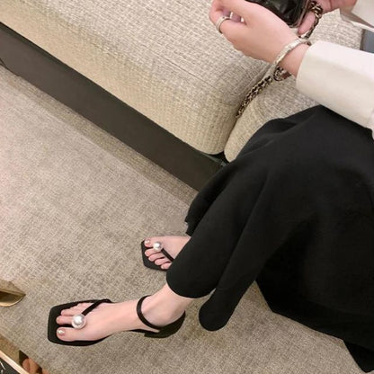 Platte sandalen met parelmoer