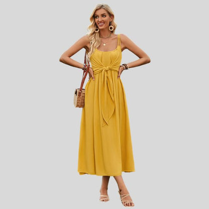 Mouwloze midi-jurk met knoopdetail aan de voorkant