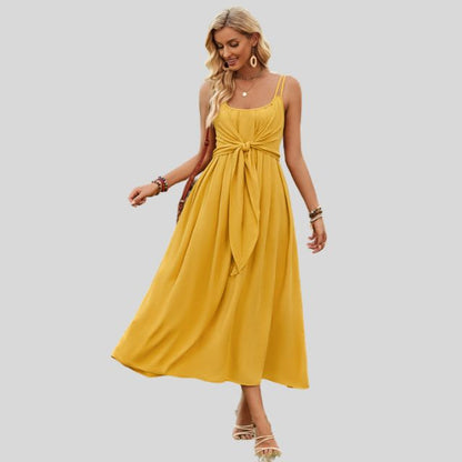 Mouwloze midi-jurk met knoopdetail aan de voorkant