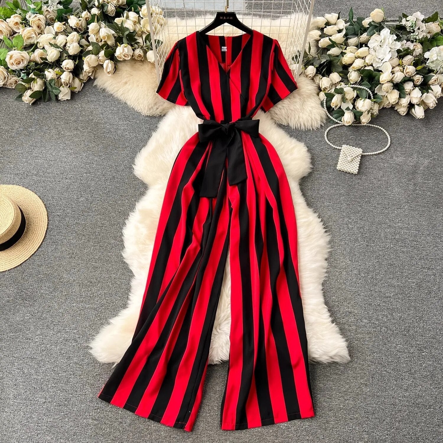 Gestreepte jumpsuit met strikdetail voor dames