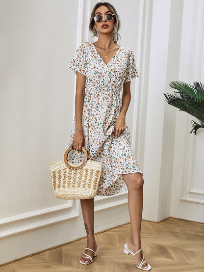 Elegante zomerjurk met bloemenprint