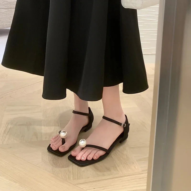 Platte sandalen met parelmoer