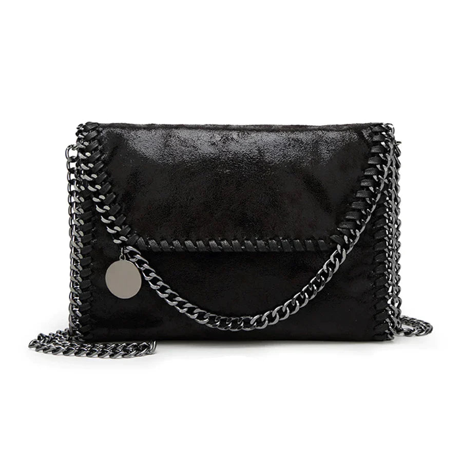 Suède clutch met kettingversiering