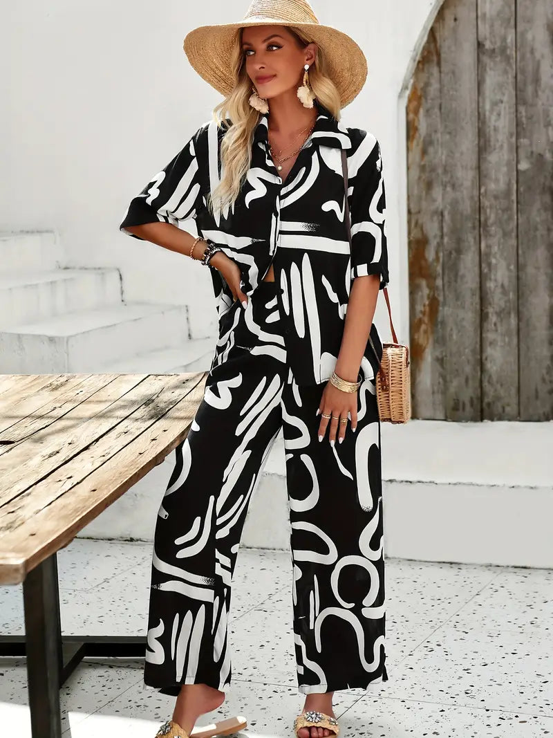 Chique tweedelige set met all-over print, shirt en broek met knoopsluiting