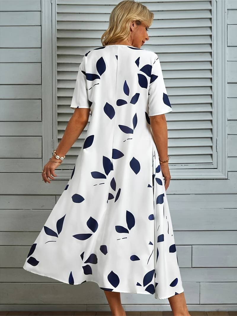 Gebloemde jurk met V-hals en ruches