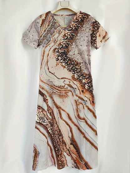 Losse, elegante jurk met abstract patroon