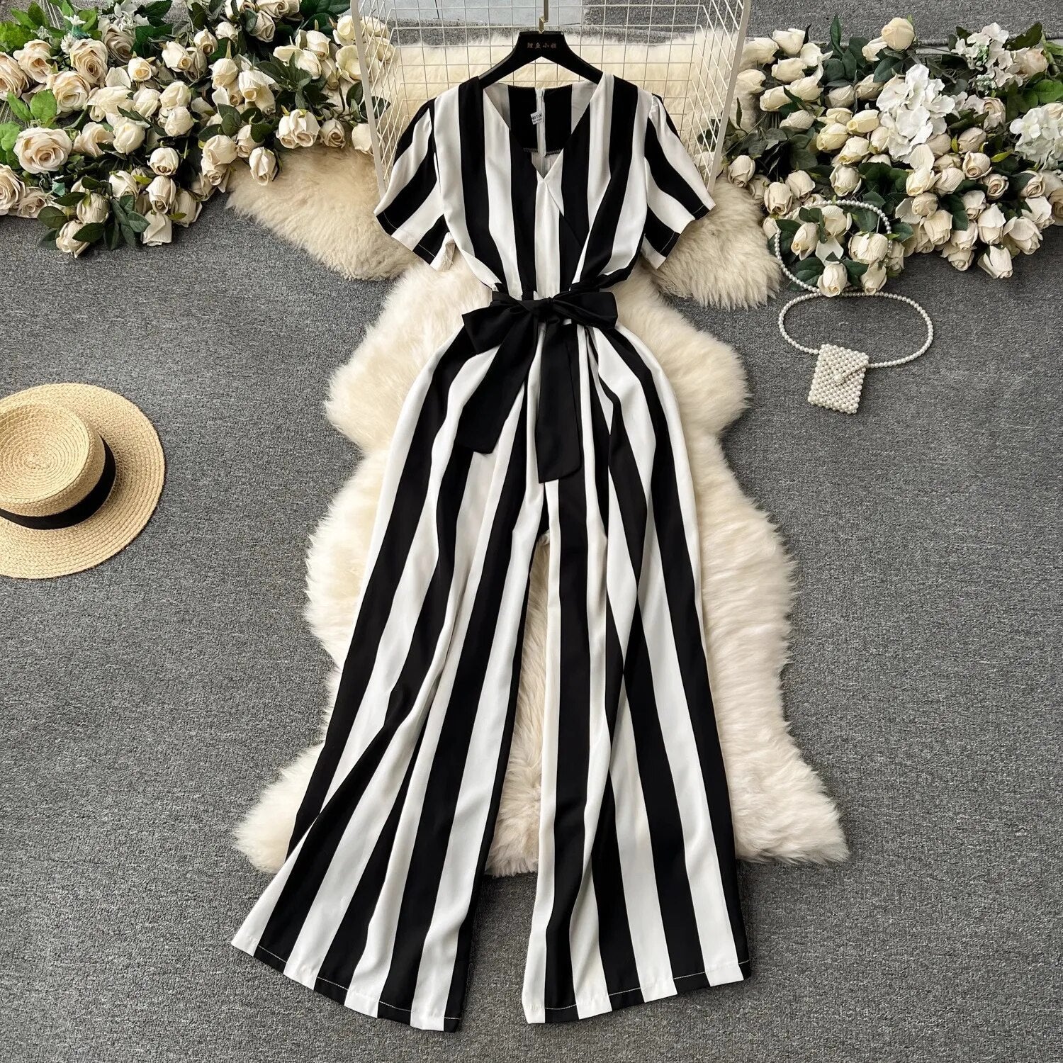 Gestreepte jumpsuit met strikdetail voor dames