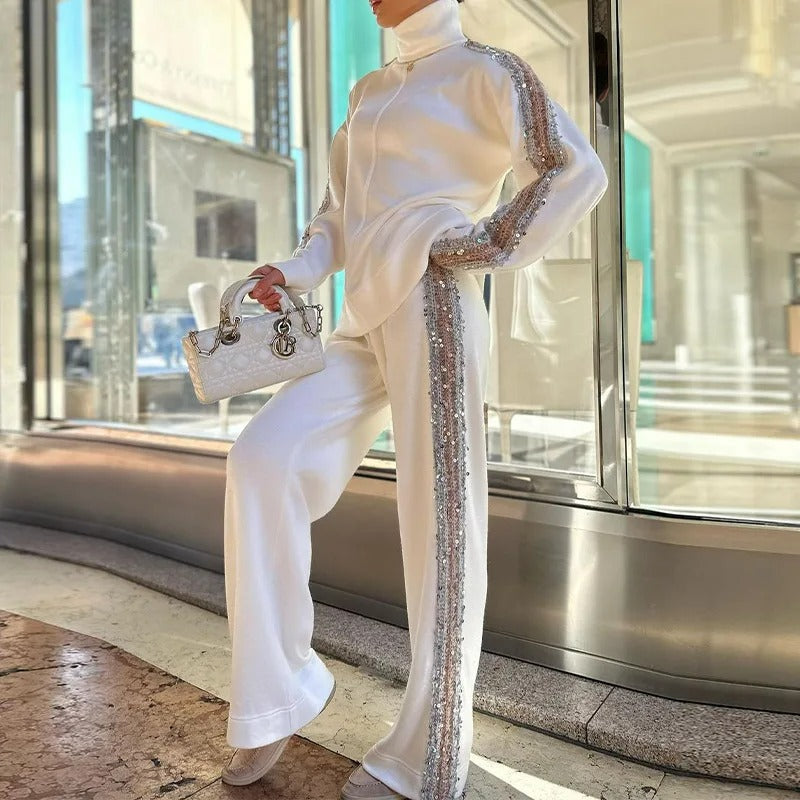 Elegante paillettentrui en patchworkbroek voor dames