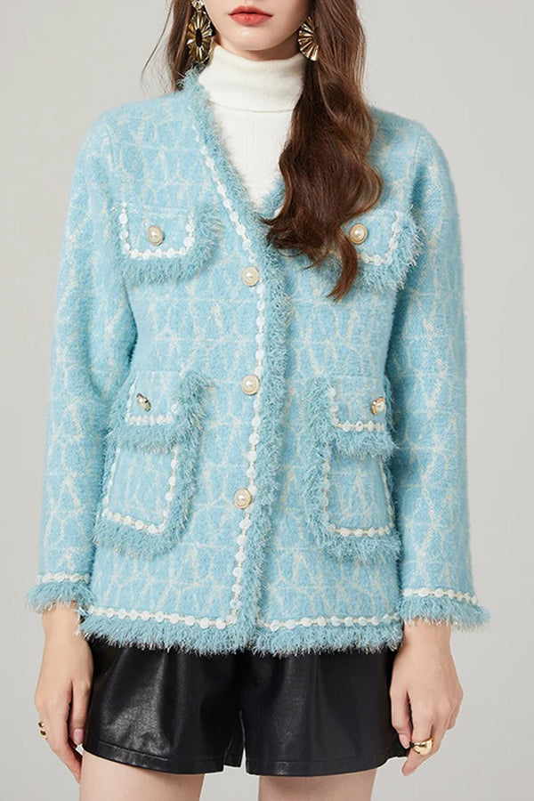 Gebreid vest in lichtblauw tweed