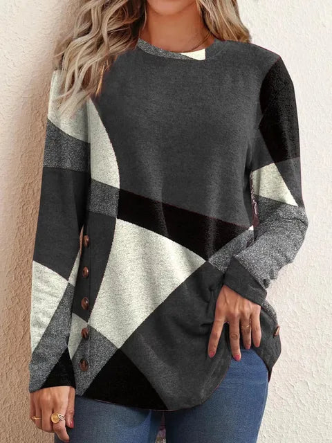 Clara - Relaxte tuniek met lange mouwen en geometrische knoopsluiting